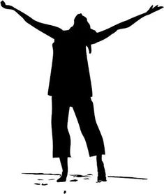 a person standing with their arms outstretched in the air