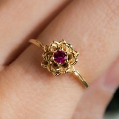 Water lily Flower Ring * July Ruby Birth Flower Ring * 14k Gold Plate Celebrate July birthdays with our exquisite Water Lily Flower Ring, a beautiful tribute to the July birth flower. The water lily symbolizes purity, enlightenment, and rebirth, making it a meaningful and elegant choice. Paired with the vibrant Ruby, the July birthstone known for its passion and protection, this 14k Gold Plated ring is perfect as a birthflower ring or a remembrance ring. Embrace the unique significance of the water lily and ruby, and honor your loved ones with this stunning piece of jewelry. Material: 14K Gold Plate Timeline: Ships right away! Stone: 3 mm Imitation Ruby Packaging: All items are nicely packaged and ready to gift in lovely jewelry boxes. The jewelry boxes are reusable and recyclable Backgrou Water Lily Ring, Water Lily Flower, July Birth Flower, Lily Ring, Ring Ruby, Jewelry Chest, July Birthstone, Birth Flower, Plated Ring