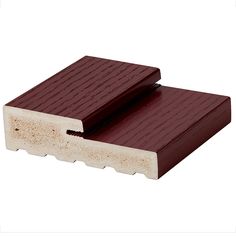 a close up of a red and white plastic decking board with wood slats