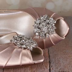 "Dress up your walk down the aisle with these lovely d'orsay peep toe custom wedding shoes. This custom wedding shoe is shown in blush and has a 1 3/4\" heel (measured as shown here: http://www.customweddingshoe.com/about-ellie-wren/heel-height-measurement/). These bridal peeptoes feature our classic rhinestone cluster on the toe. Custom Options: Like it, but don't love it? We do design shoes to your specifications!! To view our options and learn more, please visit our website at: http://www.cus Glamorous High Heel Bridesmaid Wedding Shoes, Elegant Closed Toe Bridal Accessories For Bridesmaid, Glamorous Low Heel Wedding Guest Shoes, Elegant Open Toe Bridal Party Accessories, Elegant Open Toe Heels For Bridesmaids, Elegant Open Toe Wedding Shoes For Guests, Elegant Open Toe Shoes For Wedding Guests, Gold Open Toe Wedding Shoes For Guests, Gold Open Toe Shoes For Wedding Guest