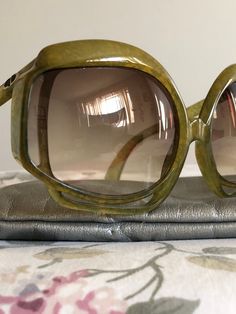 Hello and Welcome to LiamBySevanna! Prior-purchasing any listing from this shop, please Ask question/s, Request additional photos, to make sure the listed item, is the right choice for you! Per our store policy we don't accept returns Listing is for: Vintage 1970's CHRISTIAN DIOR 2026-50 optyl jade frame sunglasses ~ prewoned in great shape & condition ~ comes in an original Dior softcase PRODUCT DETAILS Made for women Color Jade green Made in Germany temple length: 135 mm height: 70 mm front: 1 Formal Green Sunglasses With Gradient Lenses, Vintage Acetate Sunglasses With Mirrored Lenses, Vintage Green Sunglasses With Gradient Lenses, Green Vintage Sunglasses With Gradient Lenses, Elegant Green Polarized Sunglasses, Modern Green Sunglasses For Formal Occasions, Elegant Green Sunglasses With Uv Protection, Luxury Green Sunglasses With Uv Protection, Vintage Green Sunglasses With Polarized Lenses