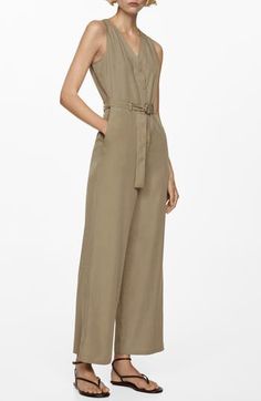 This linen-kissed jumpsuit gets a streamlined look from tonal details like the removable belt, stitches and buttons that fall down the front. Front button closure V-neck Sleeveless Removable belt 96% lyocell, 4% linen Machine wash, line dry Imported Elegant Spring Jumpsuits And Rompers With Belt Loops, Summer Workwear Jumpsuits And Rompers With Belt, Summer Workwear Belted Jumpsuits And Rompers, Spring Linen Jumpsuits And Rompers For Work, Spring Jumpsuits And Rompers With Belt Loops, Belted Jumpsuits And Rompers For Office, Linen Belted Jumpsuits And Rompers, Coverall Jumpsuit, Wide Leg Jumpsuit