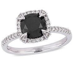 a black and white diamond ring with diamonds around the shans on it's sides