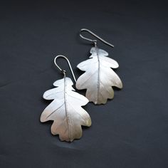 Surgical steel earrings. The individual parts are laser cut according to their own design, shaped and then joined into a finished form Oak Leaf Jewelry, Leaf Jewellery, Precious Metal Clay Jewelry, Homemade Signs, Wire Projects, Laser Cut Wood Crafts, Laser Cut Earrings, Metal Clay Jewelry, Cut Earrings