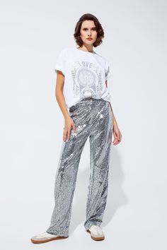 Step into the spotlight with our Dazzling Silver Sequin Party Trousers, the perfect statement piece for any festive occasion or night out. Show-Stopping Sequin Embellishments: These trousers are adorned with shimmering silver sequins, guaranteed to make you the center of attention at any party or celebratory event. Comfortable and Flattering Fit: Crafted from 100% Polyester, these trousers offer a relaxed fit that moves with you, making them as comfortable as they are glamorous. Chic High-Waiste Sequin Trousers Outfits, Party Trousers, Sequin Trousers, Sparkling Night, Trouser Outfit, Sequin Party, Pants Fit, Style Party, Silver Sequin