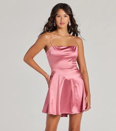 Make a grand exit after your formal affair in this flirty satin skater dress! Designed with a shiny stretch-satin fabric, it features a sleek sleeveless square neckline, bungee spaghetti straps, a bold open back with a dual bar strap design, and a fitted high waist that flares out to a short skater silhouette. Complete your look with a rhinestone necklace and earrings set and block heels.Fit & FeaturesShiny stretch-satin fabricSquare necklineBungee spaghetti strapsOpen back, dual bar strap d Fitted A-line Satin Homecoming Dress, Fitted A-line Satin Mini Dress, A-line Satin Prom Dress With Fitted Bodice, Satin Dress With Fitted Bodice For Homecoming, Satin Mini Dress With Fitted Bodice For Prom, Fitted Satin A-line Mini Dress, Fitted A-line Satin Party Dress, Fitted A-line Satin Dress For Party, Flirty Satin Mini Dress For Date Night