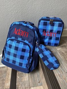 "Navy Checkers Backpack, Lunchbox and Pencil Holder Purchase includes the Backpack, Lunchbox and Pencil Holder with personalization Details for backpack 🌺Size: 11.8\"L x 5.1\"W x 16.2\"H 🌺Material: 900D polyester printed fabric, inside Lining 🌺Added Pencil case and multiple pockets are easy for organizing 🌺2 perfect parts for monogramming Details for lunch box 8\" L x 5\" W x 9\" H Polyester Easy-to-Clean Insulated Lining Perfect Fit for Storage Containers and a Water Bottle Exterior Pocket Customizable Blue Standard Backpack, Blue Rectangular Backpack For School Events, Customizable Blue School Bag, Rectangular School Backpack, Rectangular School Event Backpack, Personalized Blue Standard Backpack, Blue Lunch Bag For Back To School, Personalized Rectangular Lunch Box For School, Blue Lunch Box For Back To School Gift