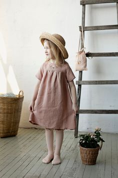 Dress with short sleeves and button in the back is made of 100% soft medium weight linen. Details: - Choose size and embroidery in the drop down menu - Colour: Dusty rose - Composition: 100% Oeko-Tex certified linen - Short sleeves - Button in the back - Medium weight linen - Linen care: machine wash gentle; tumble dry low, ironing optional - The price is for one dress, other pictured items are not included Linen Flower Dress, Pink Short-sleeved Linen Dress, Pink Linen Dress With Short Sleeves, Pink Short Sleeve Linen Dress, Rose Summer Dress, Girls Linen Dress, Summer Dress Linen, Linen Dress Pattern, Vintage Linen Dress