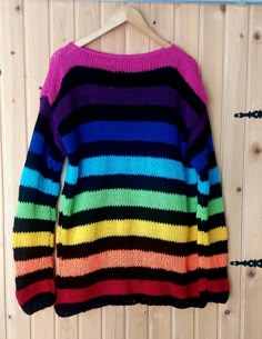 "Hand knitted grunge sweater with very long sleeves and rainbow colors stripes. Chunky knitted very oversized fitted jumper. Perfect for casual and everyday usage; will go perfectly with jeans, leggings and may combine easily with many colors especially with all blacks. This is a handknitted made to order sweater so feel free to message me for different color combinations. Approximate measurement for the sweater ; Bust / Chest: 45\" Width / Hip : 45\" Length: 32\" Sleeves: 25-28\"" Nonbinary Outfits, Rainbow Jumper, Rainbow Clothing, Sweater Grunge, Rainbow Clothes, Silly Clothes, Goth Outfit, Grunge Clothing, Gender Norms