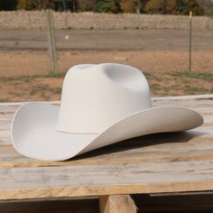 A new Stetson 4X hat to add to your collection. The Brenham is a perfect mix of western and elegance with white cream ivory wool felt, comfort leather sweatband, and 3-piece buckle hatband to match. Handmade in USA Brim 4" Cattleman Crown 4 5/8" Texas brim profile Leather sweatband Satin lining Style SWBRNM-7540