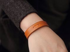 "Simple genuine leather band for him or her, Customized Bracelet, Personalized Bracelet for that special someone ★ Features: ★ ► Bracelets can be engraved on outside only  ► 7 beautiful colors to choose ,select one of the options below the title. ► 5 sizes: small, medium, large, x-large, 2x-large    ►  ( 1.5cm ) 0.6\" wide ★ Sizing:  ★ ► Small bracelets fit wrist diameters of 14cm or 5.5\" (Average Child wrist) ► Medium bracelets fit wrist diameters of 16cm or 6.25\" (Small Woman's wrist) ► Larg Personalized Leather Bracelet For Friendship, Classic Wristband Gift, Leather Wristband Gift, Classic Adjustable Wristband As Gift, Leather Strap Wristband As Gift, Classic Leather Bracelet Gift, Classic Leather Bracelet With Leather Strap As Gift, Hand Stamped Brown Leather Bracelet Gift, Classic Leather Strap Bracelet As A Gift