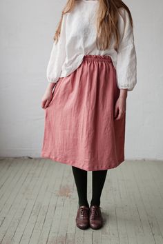 Below the knee skirt is made from 100% soft and washed linen. This Petticoat is perfect for wearing under dress or other skirt or can be worn alone. Match it with our tunics! Details: - Composition: 100% Oeko-Tex certified linen - Colour: salmon pink - Elastic waist - Pockets - Medium weight linen - Linen care: machine wash gentle; tumble dry low, ironing optional - The price is for one skirt, other pictured items are not included Solid Color Relaxed Fit Long Skirt, Solid Color Long Skirt With Relaxed Fit, Solid Long Skirt With Relaxed Fit, Relaxed Cotton Lined Pencil Skirt, Long Gathered Skirt With Relaxed Fit, Relaxed Fit Long Gathered Skirt, Relaxed Fit Pleated Skirt, Relaxed Fit Skirt With Elastic Waistband, Cotton Skirt With Relaxed Fit In Solid Color