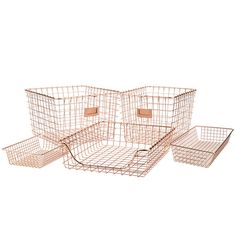 three metal baskets with tags on them