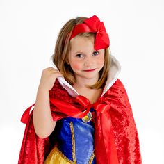 This Snow White Princess Cloak is a great costume accessory for any princess! The Cloak is made from 2 layers of 100% Polyester Crushed Velour with a white satin collar and red satin ribbon tie.Sizing: Kids - 30" long Adult - 46" long Adult - 56" long Care: Spot clean. Hang to dry. This Snow White Princess Cloak is Made to Order. Please allow additional time for our team to create this custom cloak before it is shipped out. For more information on our current production times, please see our Shipping Policy. Princess Cloak, Medieval Cloak, Red Princess, White Princess, Red Satin, Ribbon Tie, White Satin, Cloak, Satin Ribbon