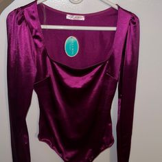 Great Condition! New With Tags! Chic Fitted Purple Bodysuit, Purple Long Sleeve Bodysuit For Spring, Chic Purple Stretch Bodysuit, Chic Stretch Purple Bodysuit, Trendy Purple Bodysuit For Party, Trendy Purple Party Bodysuit, Spring Party Purple Bodysuit, Satin Long Sleeve, Long Sleeve Bodysuit