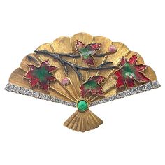 18K Yellow Gold Emerald Chinese Traditional Fan Enameled Brooch Pendant 1 Emerald - 0.063 CT 26 Diamonds - 0.241 CT 18K Yellow Gold - 5.87 GM Enamel Surface - 0.15 CT Brooch / Pendant Highly Customizable Exquisitely crafted, this 18K yellow gold pendant seamlessly blends traditional Chinese artistry with modern elegance. The delicate fan shape, inspired by the iconic Chinese paper fan, is meticulously enameled in vibrant hues, capturing the essence of timeless cultural heritage. The pendant's versatility allows it to be worn as both a brooch and a necklace, making it a versatile accessory that can effortlessly transition from day to night. The emerald accents add a touch of sophistication, complementing the rich, golden tones of the 18K gold. Whether adorning a casual ensemble or elevating Chinese Paper, Paper Fan, Gold Lion, Dragonfly Pendant, Necklace Making, Paper Fans, Natural Coral, Enamel Brooch, Gold Brooches