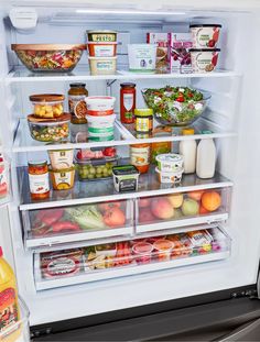 an open refrigerator filled with lots of food