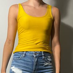 Very Soft Yellow Tank Top. Never Worn Plain Yellow Top For Spring, Yellow Fitted Tops For Everyday, Fitted Yellow Tops For Everyday, Trendy Yellow Tank Top, Yellow Fitted Tank Top, Yellow Fitted Casual Tank Top, Fitted Yellow Tank Top, Trendy Yellow Tops For Everyday, Fitted Neon Yellow Casual Tops