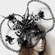 Elegance Meets Sophistication In This Striking Fascinator. With Its Bold Black Hue And Large Size, This Headpiece Exudes A Sense Of Grandeur And Style. Perfect For Tea Parties, Races, Soires, Church Events, Memorials, And Funerals, This Fascinator Is A Versatile Accessory That Adds A Touch Of Glamour To Any Ensemble. Its Intricate Design And Attention To Detail Make It A Truly Gorgeous Piece That Is Sure To Turn Heads And Leave A Lasting Impression. Whether You're Attending A Formal Event Or Loo Fascinator Hair, Bohemian Party, Black Fascinator, Hat Party, Satin Dress Long, Flower Hat, Wedding Fascinators, Church Events, Feather Flower