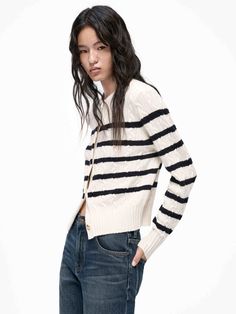 MO&Co. Women's Cable Texture Striped Cardigan Introducing the cardigan, a luxurious blend of warm wool and cashmere fabrics. This timeless staple features a black and white striped pattern and the fitted silhouette further celebrates the sophistication of this stylish piece. Features : - Warmth and comfort wool and cashmere fabric- Classic black and white striped- Cropped and slim fit Code: MBC4CART07The back length of size S is 50.5cmMATERIALS & CARE Material: 70% Wool 30% CashmereWrap metal pa Cashmere Fabric, White Cardigan, Striped Cardigan, Cropped Cardigan, Color Stripes, Classic Black, White Stripe, Cashmere, Cotton Blend