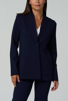 Crafted in luxe ponte with plenty of stretch, this sleek blazer feels like a second skin. Pair it with any of our coordinating pants for a thoroughly modern suit. ✓ Wrinkle Free ✓ Four-Way Stretch ✓ Office Ready ✓ All-Day Comfort ✓ Day to Night ✓ Core Collection DETAILS Open front Single fabric-covered button Patch pockets FIT Regular fit True to size Model is 5'8" and wears size S MEASUREMENTS Center back length: 26.5" (size S) FABRIC + CARE 67% rayon, 30% nylon, 3% Spandex Dry clean only. Night Core, Modern Suits, Ponte Pants, Long Blazer, Instagram Outfits, Fabric Covered Button, La Fashion, Black Xs, Black Blazers