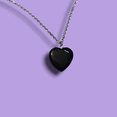 "This black heart necklace screams 90s goth / grunge vibes. Perfect for all day wear and into the night. The black obsidian heart rests on a 24 inch stainless steel chain. A simple but fashionable piece of gothic style jewelry. Makes for an excellent gift for her! * Necklace chain is made of stainless steel  and is 24\" long. It sits at about center chest. * Black heart obsidian center stone. * Ships out within 3 business days from the US. For more goth, grunge, and punk style necklaces or jewelry, check out the rest of my shop at www.etsy.com/shop/QuirkyKorner - Shipping - * Item(s) will ship out within 3 business days. * Business days are Monday through Friday (excluding US Holidays). * US shipping only." Edgy Black Necklaces For Gift, Edgy Black Necklace For Gift, Edgy Black Necklaces For Gifts, Edgy Black Necklace As Gift, Punk Style Black Necklace For Gift, Gothic Black Necklace For Gift, Punk Heart Necklace As A Gift, Punk Heart Pendant Necklace For Gift, Punk Black Necklace With Heart Pendant