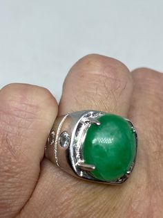 Vintage Lucky Green Nephrite Jade ring Large green nephrite jade Ornate German Silver Vintage ring, does not tarnish, NOT sterling Sizes 7 My jeweler can custom re size for a $10-$20 fee All rings are shipped free in the US in a nice gift box. Check out our over a THOUSAND great reviews Engraving is $4 per letter and is not always perfect depending on the piece. It can take a few days if the jeweler is busy. This is payable to Paypal Judithsltd@gmail.com Oval Green Emerald Signet Ring, Oval Emerald Signet Ring In Green, Green Dome Ring With Polished Finish For Anniversary, Green Emerald Cabochon Rings, Green Crystal Gemstone Ring For Spiritual Wear, Green Cabochon Emerald Ring For Anniversary, Green Oval Signet Ring For Anniversary, Green Spiritual Jewelry With Polished Finish, Jade Gemstone Rings For Healing