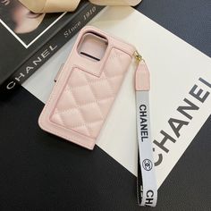 Luxurious Genuine Leather Construction: The Chanel crossbody bag iPhone case is crafted from high-quality genuine leather, providing a rich texture and exceptional durability. The premium leather ensures a luxurious feel and sophisticated look. Integrated Wallet Functionality: This case features a built-in wallet with multiple card slots and a secure compartment for cash or small essentials. The wallet functionality adds convenience, allowing you to carry your essentials in one stylish accessory. Versatile Crossbody Design: Equipped with an adjustable leather strap, the case can be worn as a crossbody bag, offering hands-free convenience. The versatile design makes it perfect for on-the-go lifestyles, combining fashion with practicality. Iconic Chanel Branding: Adorned with the iconic Chan Elegant Rectangular Phone Accessories With Card Slots, Luxury Rectangular Mobile Phone Bag, Luxury Leather Phone Accessories, Elegant Leather Rectangular Phone Accessories, Luxury Mobile Phone Bag For Everyday Use, Luxury Rectangular Phone Accessories For Travel, Luxury Leather Phone Accessories For Everyday Use, Luxury Wallets With Cell Phone Pocket, Luxury Phone Bag With Card Slots For Daily Use