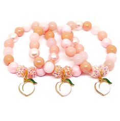 These adorable bracelets are the perfect favor for your little one's peach themed party! Each bracelet features a gold plated peach charm, resin rhinestone beads and an assortment of pink and peach 10mm acrylic beads strung with durable stretch floss cord. Each bracelet will arrive individually packaged in organza bags. Please select the size and quanity needed from the drop down menus. Bead styles and exact shades will vary. To be the first to know about new items, sales and giveaways, mark my Cheers Theme, Bead Styles, Peach Bracelet, Peach Party, Fruit Party, Cardboard Jewelry Boxes, Small Jewelry Box, Cute Bracelets, Rhinestone Bead