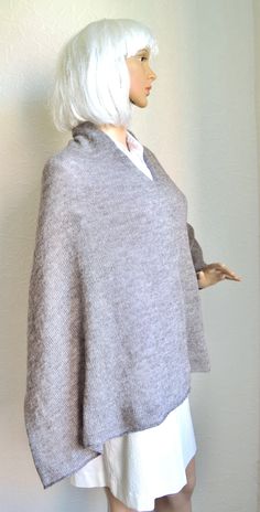 Grey women's poncho handmade from soft, light and little bit fluffy mohair - wool yarn. Warm, quality and cosy. This long poncho will warm you up in chilly evening. Edge facings accurately decorated by hand with crochet hook. Accurately knitted from high quality yarns, so, poncho is durable and easy to maintain. Also it's available hand knitted works according to your model and size. Size: universal, length 30'' (76cm), width 30'' (76cm). Fiber: mohair - wool yarns. Care: hand wash at 30 degrees Cozy Alpaca Shawl One Size, Cozy Knitted Alpaca Poncho, Handmade Alpaca Poncho Shawl, Handmade Alpaca Shawl Poncho, Handmade Alpaca Shawl For Winter, Cozy Alpaca Shawl For Winter, Cozy Alpaca Shawl, Knitted Alpaca Shawl, One Size Alpaca Poncho