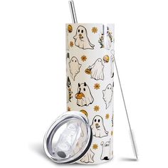 thermos cup with its lid and straw in front of it is decorated with halloween ghost