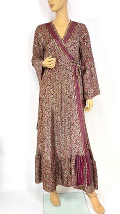 Vintage sari wrap long style dress with a front closure formed by wrapping one side across the other and knotting the attached ties that wrap around the back or in the front or on the side. Dress has V-shaped neckline and accentuate the wearer's curves. The beautiful dress has flowing arms. Wrap dress are always such a flattering fit as you can tie them perfectly to fit your own body shape. Feel like feather to your skin With the tie at the waist you can choose to have a more fitted look, or lea Traditional V-neck Maxi Dress With Boho Print, Bohemian Maxi Length Kimono For Eid, Bohemian Maxi Kimono For Eid, Traditional Flowy Maxi Dress For Festive Season, Bohemian Maxi Length Kimono For Festive Occasions, Bohemian Festive Maxi Length Kimono, Bohemian Floor-length Kimono For Spring, Bohemian Maxi Wrap Dress, Festive Bohemian Maxi Length Kimono