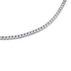 This tennis necklace is the epitome of elegance. A single row of scintillating round brilliant diamonds is set on four prong baskets and lined up perfectly to create a glamorous diamond necklace to complement your tennis bracelet perfectly. 14k White Gold Eternity/Line/Tennis Necklace 4-Prong Round Full Cut Diamonds = 5.66 Carats tw G-H Color VS2-SI1 Clarity 17" long Hidden diamond barrel clasp with safety Diamond Tennis Necklace, Tennis Necklace, Store Hours, Brilliant Diamond, Tennis Bracelet, Round Brilliant, 3 Weeks, Diamond Necklace, Diamond Cuts