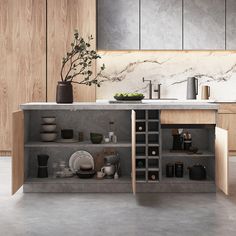 a kitchen with marble counter tops and wooden cabinetry, filled with pots and pans