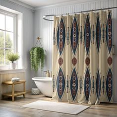 a bathroom with a tub, sink and shower curtain that has an abstract design on it