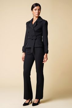 "Cut for a flattering slim-fit, this double breasted black blazer is crafted from a lightweight, luxurious viscose fabric. Complete with a cloverleaf lapel and finished with two-button cuffs - this blazer comes with the option of matching fitted pencil tuxedo pants, to form a womens suit. Jacket: - fitted silhouette - peplum style - cloverleaf lapel - double breasted closure - fabric buttons - matching fabric belt with buckle - fully lined Pants: - high rise - straight style - hook&loop + zi Suit Trousers Women Outfit, Pantsuit Outfit, Trousers Women Outfit, Black Pantsuit, Black Pant Suit, Womens Suit, Pant Suits For Women, Woman In Suit, Below The Knee Dresses