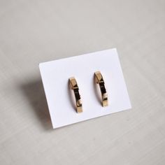 This earring is simple yet so eye-catching. Since it's curved, it kind of wraps down around the bottom of your earlobe. It's so unique, minimal, and timeless. Perfectly tiny. Available in two sizes:Small .4" - if you have a smaller earlobe this is your size! Or if you want to wear this in your second hole.Large .6" - if you have a larger, thicker, or longer ear lobe, this is your size! 14K SOLID GOLD - jewelry made entirely of gold -- inside and out. It’s the most expensive and durable among the Everyday Adjustable Small Hoop Wrap Earrings, Classic Everyday Hypoallergenic Ear Climbers, Classic Gold Ear Climbers For Everyday, Minimalist Nickel-free Huggie Earrings For Formal Occasions, Classic Everyday Ear Climbers With Matching Earrings, Minimalist Nickel Free Huggie Earrings For Formal Occasions, Minimalist Small Hoop Yellow Gold Wrap Earrings, Gold Minimalist Cartilage Earrings For Everyday, Minimalist Nickel-free Ear Climbers For Everyday