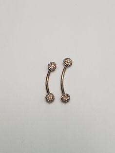 Elevate your belly button piercing with our stunning Rose Gold Rhinestone Plus Size Belly Button Ring. Made from high-quality 316L anodized stainless steel, this belly button ring is not only durable and hypoallergenic but also gives off a beautiful rose gold hue. With three custom sizes available, it's easy to find the perfect fit for your plus size body. The addition of rhinestones adds a touch of glamour, making this belly button ring the perfect accessory for any occasion. Whether you're loo Internally Threaded Metal Belly Rings, Metal Internally Threaded Belly Rings, Adjustable Metal Belly Rings Internally Threaded, Adjustable Internally Threaded Metal Belly Rings, Elegant Nickel-free Belly Rings, Elegant Stainless Steel Internally Threaded Piercings, Button Piercing, Belly Button Ring, Belly Button Piercing