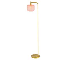 a gold floor lamp with a pink shade