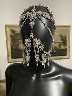 Rhinestone Silver headpiece Silver crystal Veil A silver crystal chain veil that would be perfect for weddings and festivals This gorgeous face mask is designed with clear rhinestones, and a silver chain. You will be the center of attention with these sparkling jewels at a party or to your wedding! This crystal it looks amazing under stage lights. Crystal Veil, Silver Headpiece, Veil Crystal, Chain Mask, Rhinestone Headpiece, Silver Head Piece, Crystal Headpiece, Mask Fashion, Head Chain