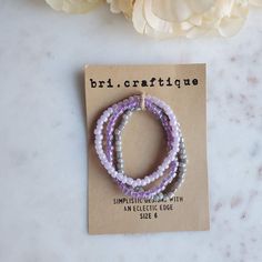 Perfect for the purple lover in your life, this stretch seed bead set delivers all the lavender vibes. Lilacs and iridescence create the perfect combo for all your pastel dreams. (Bracelet sold as a set)Size shown: 7 inches Strung on pre-stretched bracelet material. SIZINGThe sizing chart is the standard for stretch bracelets. Since material is pre-stretched there is some leeway or give as far as how the bracelet fits on your wrist. TIP FOR MEASURING: Best rule of thumb when measuring your wrist Cheap Adjustable Lavender Beaded Bracelets, Lavender Beaded Bracelets With Round Beads As Gift, Adjustable Lavender Bracelets With Spacer Beads, Lavender Bracelets With Tiny Beads For Gift, Purple Stretch Bracelet With Tiny Beads As Gift, Bohemian Purple Stretch Bracelet With Faceted Beads, Adjustable Purple Faceted Beads, Adjustable Lavender Bracelet With Tiny Beads, Lavender Beaded Bracelet With Tiny Beads For Gifts