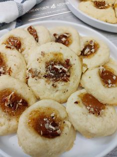 there are many small cookies on the plate