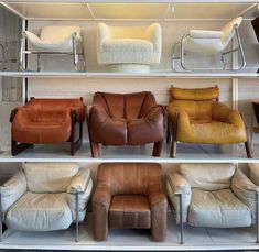 several different types of leather chairs on display