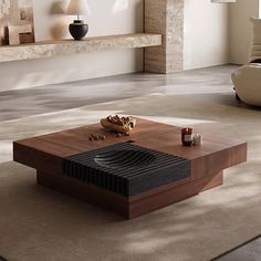 a coffee table sitting on top of a carpeted floor