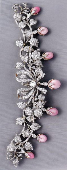 An antique bodice ornament, bu Tiffany & Co., circa 1890-95. Composed of platinum, gold, diamonds and conch pearls. Image source: Bejewelled by Tiffany, 1837-1987. #Tiffany #antique #BodiceOrnament Rings Art Deco, Conch Pearl, Tiffany Rings, Bijoux Art Nouveau, Tiffany Jewelry, Fabulous Jewelry, Dream Jewelry, Antique Jewellery