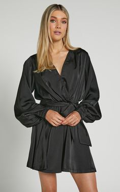 Get ready to turn heads in our Laura Mini Dress! This flirty and playful long sleeve wrap dress is perfect for a night out on the town. With its sultry V neck and figure-flattering silhouette, you'll feel confident and sexy all night long. The black color adds a touch of sophistication, making it the ideal choice for any party or special occasion. Whether you're hitting the dance floor or sipping cocktails with friends, this mini dress will have you looking effortlessly chic. So go ahead and mak Neck Wrap Dress, Wrap Dress Styles, Long Sleeve Wrap Dress, Neck Wrap, Mini Wrap Dress, Long Sleeve Mini, The Dance, Dance Floor, Every Girl