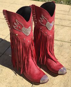 Ok, friends! Here we go1,000% authentic, genuine SWAROVSKI crystal rhinestone cowboy boots. These are not knock off stones, these are THE REAL DEAL! They are made with only the strongest adhesives and stones ranging in sizes from 3-6 mm for the brightest sparkle Soooooo fun! These boots are a gorgeous shade of deep crimson red, and are encrusted throughout with clear stones. These are man made material boots, yet still very nice quality. They have a really neat fringe flow curtain as well....I l Western Rhinestone Fringe Boots For Fall, Western Boots With Rhinestone Fringe For Fall, Western Rhinestone Boots With Round Toe, Western Boots With Rhinestones And Round Toe, Rhinestone Boots With Round Toe For Rodeo, Western Snip Toe Boots With Rhinestones, Western Boots With Rhinestone Fringe And Round Toe, Western Boots With Rhinestones And Snip Toe, Western Style Snip Toe Boots With Rhinestones