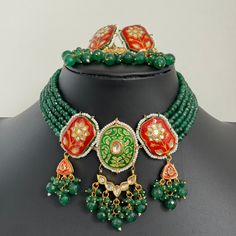 Green meenakari Kundan Necklace/Rajwadi Kundan choker/Indian necklace/Indian jewelry/Pakistani Jewelry/Punjabi Jewelry/bridal necklace Antique Classic Necklace With Gold Plating Regular Size And Adjustable Antique Necklace Set Ships from California and delivery in 2-5 business days in the USA.  The set includes a Necklace, Earrings, and Tikka Color, shades, and texture displayed may slightly vary from the actual product due to digital image limitations. We request you consider these minor variations. Please expect the possibility of some slight imperfections when buying handmade jewelry.  Please let me know if you have any questions. Arrives in a gift box. Thank you so much for visiting my shop. Luxury Meenakari Necklaces For Diwali, Cheap Festive Meenakari Jewelry, Luxury Green Meenakari Danglers, Traditional Meenakari Jewelry Sets Chandbali Style, Traditional Meenakari Jewelry Sets For Diwali, Traditional Meenakari Chandbali Jewelry Sets, Diwali Chandbali Choker With Zari Work, Navratri Meenakari Jewelry Sets, Bollywood Meenakari Jewelry Sets For Festive Occasions