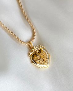 Mon Amour Locket - bijoulimon.com Spiritual Locket Jewelry For Valentine's Day, Mother's Day Pendant Locket Necklace With Charms, Gold Heart Locket Necklace Spiritual Style, Gold Heart-shaped Spiritual Locket Necklace, Spiritual Gold Heart Locket Necklace, Spiritual Heart Locket Necklace, Gift Locket Pendant Necklace With Lobster Clasp, Spiritual Heart-shaped Locket Necklace, Gift Locket Necklace With Lobster Clasp Pendant