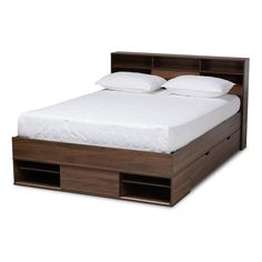 the bed is made and has two drawers on each side that are open for storage